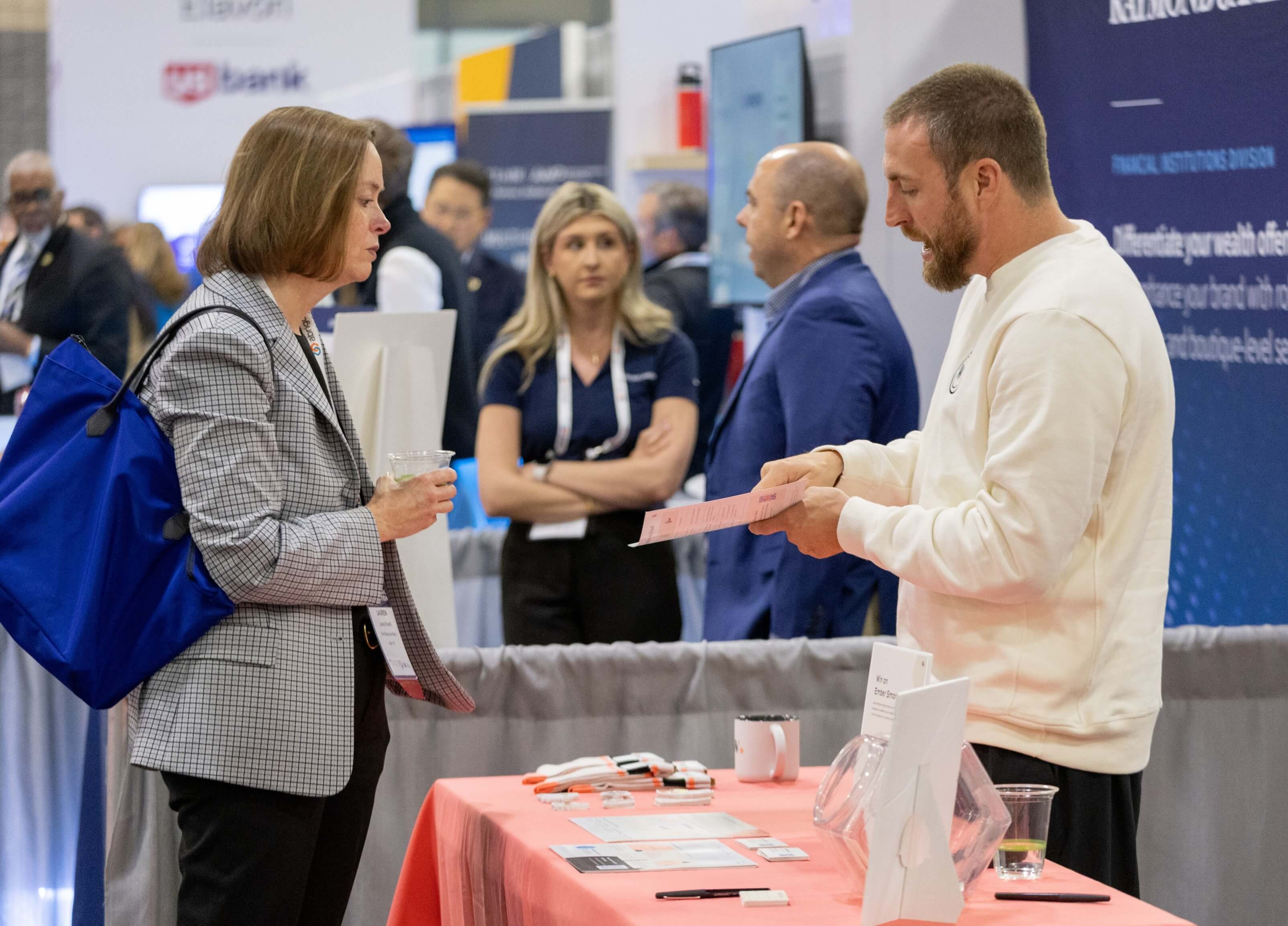 exhibitor talking to a banker